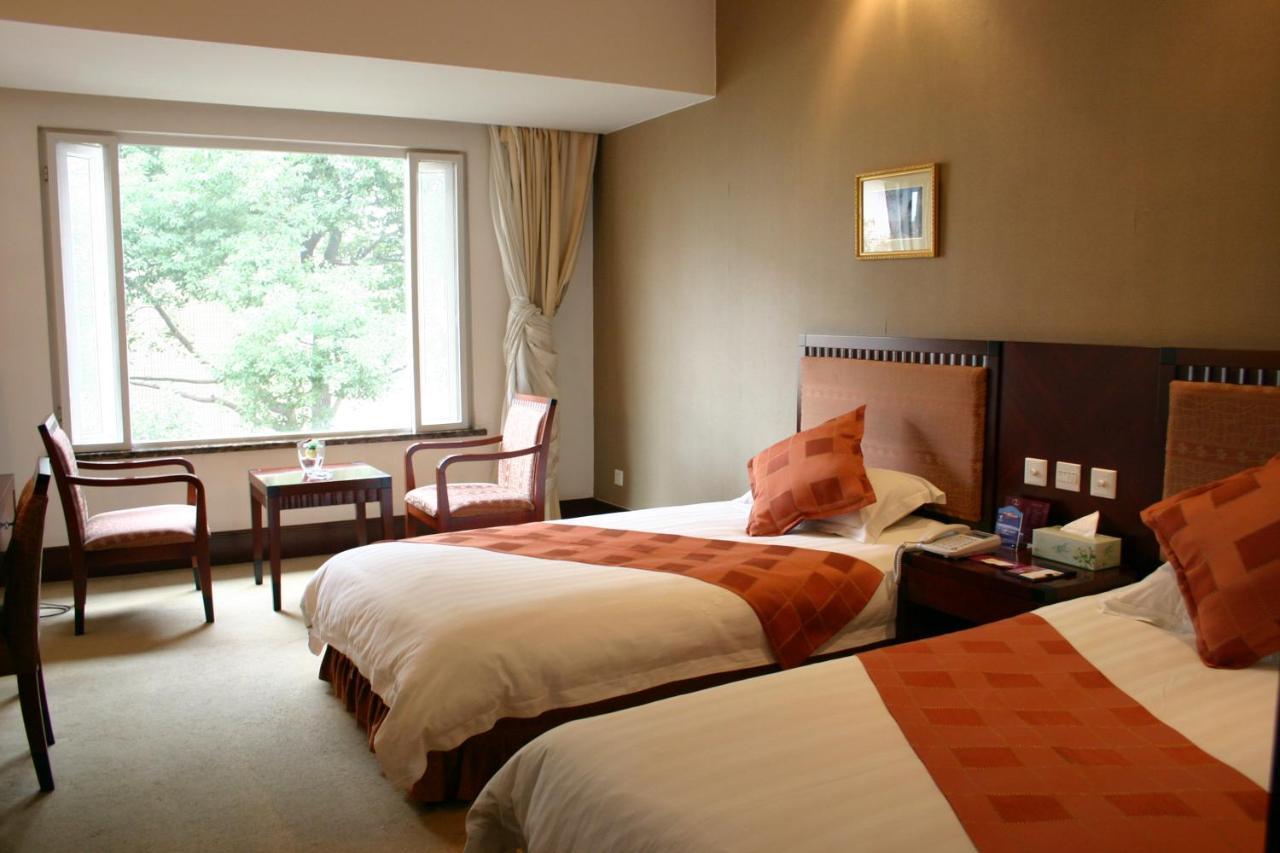 Suzhou Taoyuan International Holiday Hotel Room photo